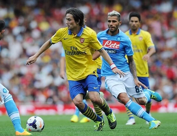 Arsenal's Tomas Rosicky Outmaneuvers Napoli's Valon Behrami in the 2013 Emirates Cup