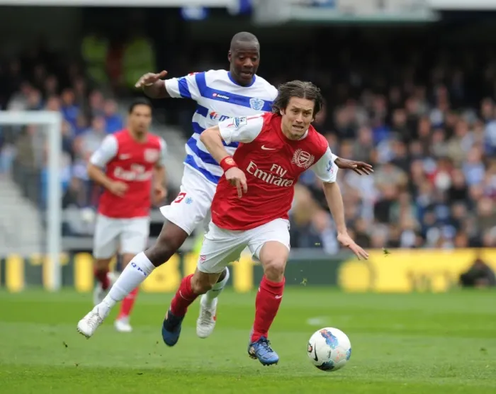 Framed Print : Arsenal's Tomas Rosicky Outmaneuvers QPR's Samba Diakite in Premier League Clash (2011-12)