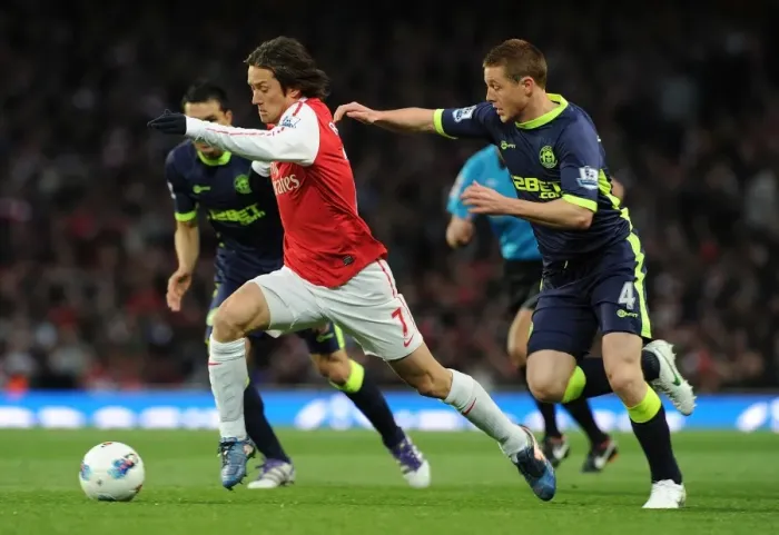 Framed Print : Arsenal's Tomas Rosicky Outmaneuvers Wigan's James McCarthy