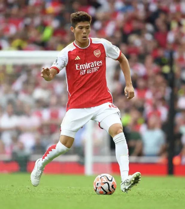 Framed Print : Arsenal's Tomiyasu in Action: 2023-24 Premier League - Arsenal vs. Nottingham Forest
