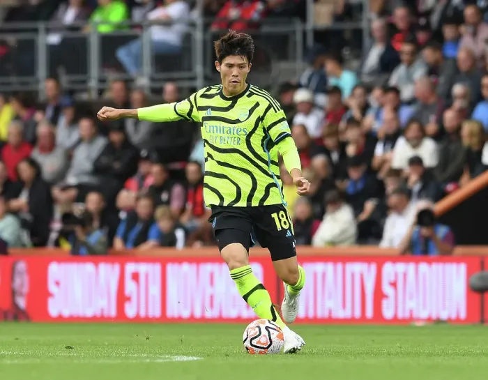 Framed Print : Arsenal's Tomiyasu in Action against AFC Bournemouth in 2023-24 Premier League Framed Print : Arsenal's Tomiyasu in Action against AFC Bournemouth in 2023-24 Premier League