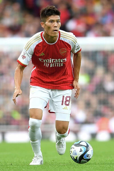 Arsenal's Tomiyasu in Action: Arsenal FC vs AS Monaco, Emirates Cup 2023-24