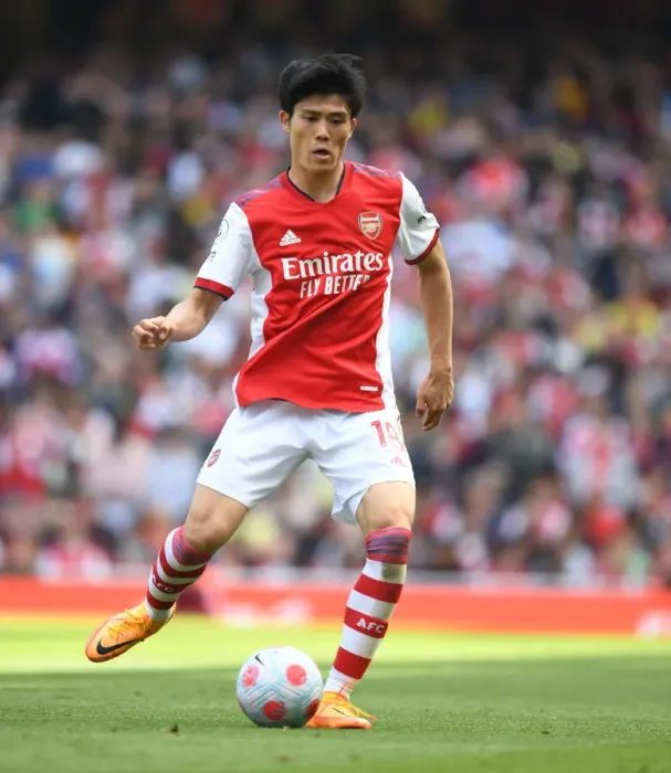 Framed Print : Arsenal's Tomiyasu in Action: Premier League 2021-22 - Arsenal vs Leeds United