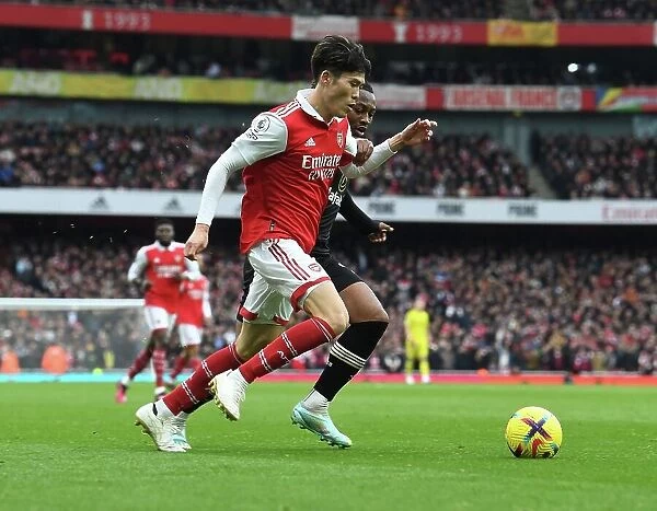 Arsenal's Tomiyasu in Action: Premier League 2022-23 - Arsenal vs. AFC Bournemouth