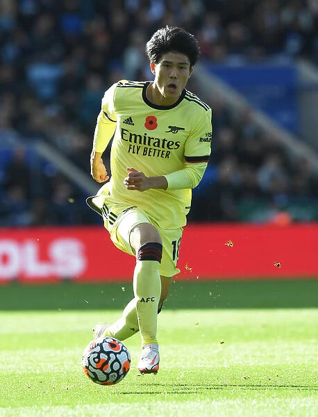 Arsenal's Tomiyasu in Action: Premier League Battle between Arsenal and Leicester City