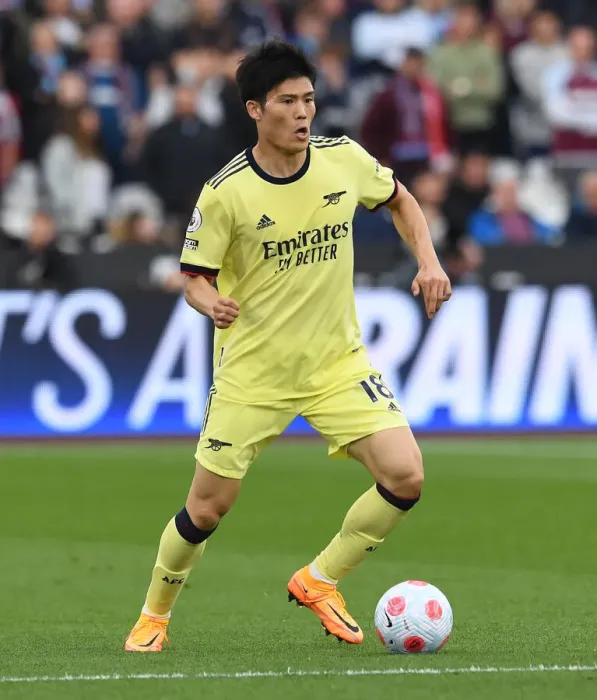 Framed Print : Arsenal's Tomiyasu in Action against West Ham United - Premier League Showdown, London 2022