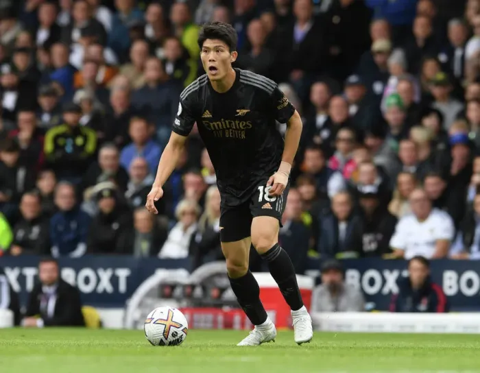 Framed Print : Arsenal's Tomiyasu Faces Off Against Leeds United in Premier League Clash Framed Print : Arsenal's Tomiyasu Faces Off Against Leeds United in Premier League Clash