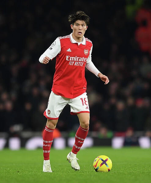 Arsenal's Tomiyasu Faces Off Against Manchester United in Premier League Battle (2022-23)