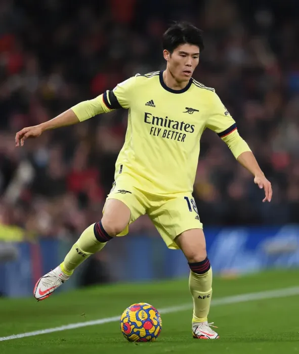 Framed Print : Arsenal's Tomiyasu Faces Off Against Manchester United at Old Trafford (Premier League 2020-21) Framed Print : Arsenal's Tomiyasu Faces Off Against Manchester United at Old Trafford (Premier League 2020-21)