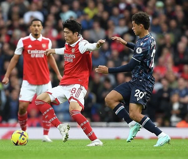 Arsenal's Tomiyasu Outruns Forest's Johnson in Premier League Clash