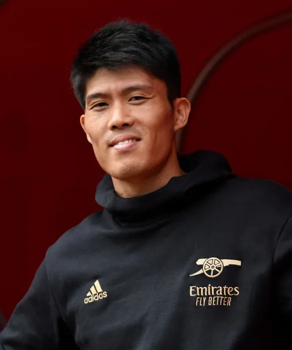 Framed Print : Arsenal's Tomiyasu Readies for Battle: Arsenal vs Sevilla - Emirates Cup 2022