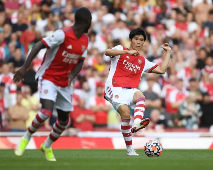 Framed Print : Arsenal's Tomiyasu Stands Out: Arsenal vs. Norwich City (Premier League 2021-22)