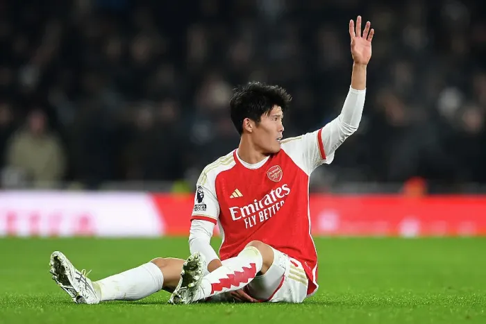 Framed Print : Arsenal's Tomiyasu Suffers Injury in Arsenal v Wolverhampton Wanderers Premier League Clash (2023-24)