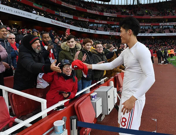 Arsenal's Tomiyasu Surprises Fan with Shirt after New Victory