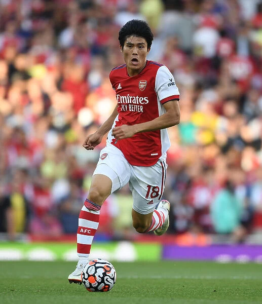 Arsenal's Tomiyasu Takes Action: Premier League Showdown Against Tottenham 2021-22