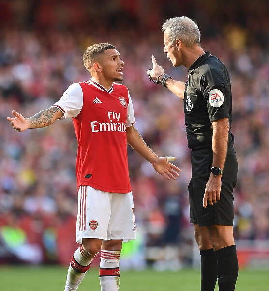 Arsenal's Torreira Argues with Referee during Arsenal v Tottenham Premier League Clash