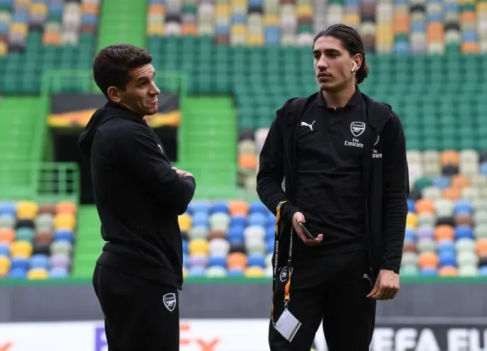 Framed Print : Arsenal's Torreira and Bellerin Scout Sporting Lisbon's Estadio Jose Alvalade Pitch Ahead of Europa League Clash Framed Print : Arsenal's Torreira and Bellerin Scout Sporting Lisbon's Estadio Jose Alvalade Pitch Ahead of Europa League Clash