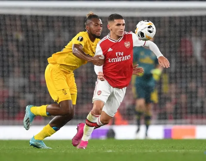 Framed Print : Arsenal's Torreira Faces Off Against Standard Liege's Bastien in Europa League Clash Framed Print : Arsenal's Torreira Faces Off Against Standard Liege's Bastien in Europa League Clash