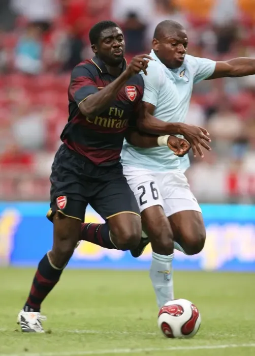 Framed Print : Arsenal's Toure Clashes with Mudingayi: Arsenal 2:1 Lazio, Amsterdam Tournament Day 1