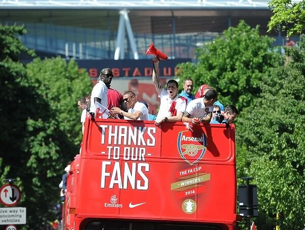 Arsenal's Triumph: The 2014 Trophy Parade in Islington
