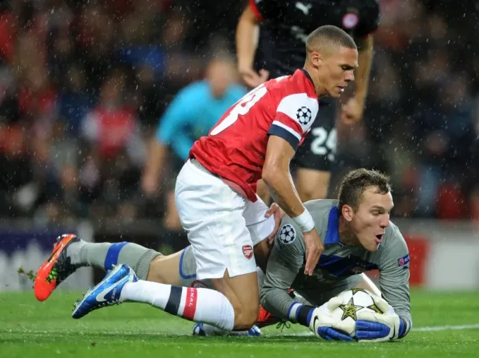 Framed Print : Arsenal's Triumph: 3-1 Victory Over Olympiacos in UEFA Champions League Group B (2012)