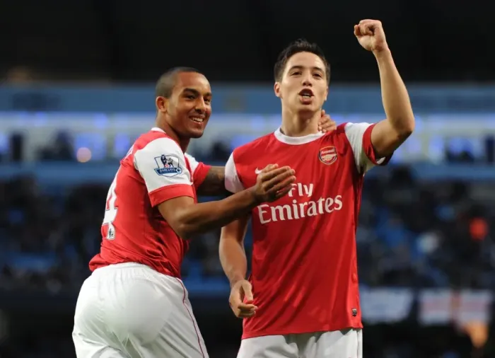 Framed Print : Arsenal's Triumph: Theo Walcott and Samir Nasri's Jubilant Celebration of Bendtner's Goal (3-0 vs Manchester City, 2010)