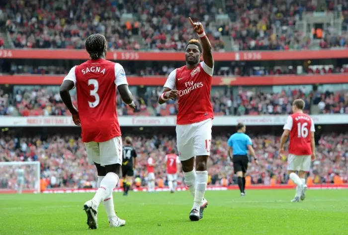 Framed Print : Arsenal's Triumph: Alex Song and Bacary Sagna Celebrate 3-0 Over Bolton Wanderers