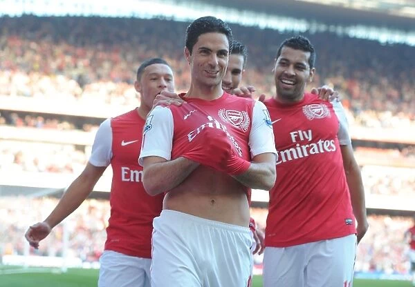 Arsenal's Triumph: Arteta, Santos, and van Persie Celebrate Goals Against Aston Villa, 2011-12