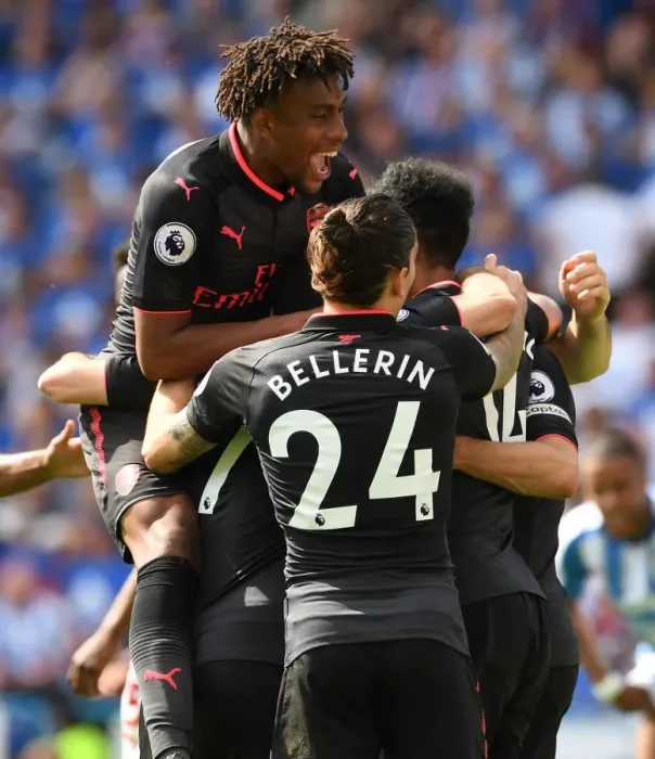 Framed Print : Arsenal's Triumph: Aubameyang, Iwobi, and Bellerin in Unison after Scoring against Huddersfield Town
