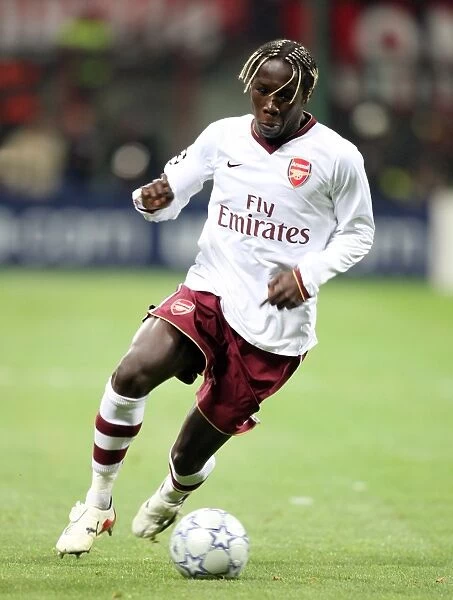 Arsenal's Triumph: Bacary Sagna Leads the Gunners to a 2-0 Victory over AC Milan in the UEFA Champions League (2008)
