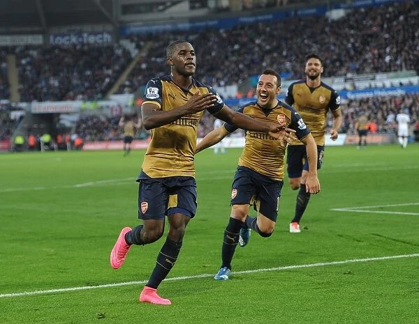 Arsenal's Triumph: Campbell and Cazorla Celebrate Goal vs Swansea City (2015-16)