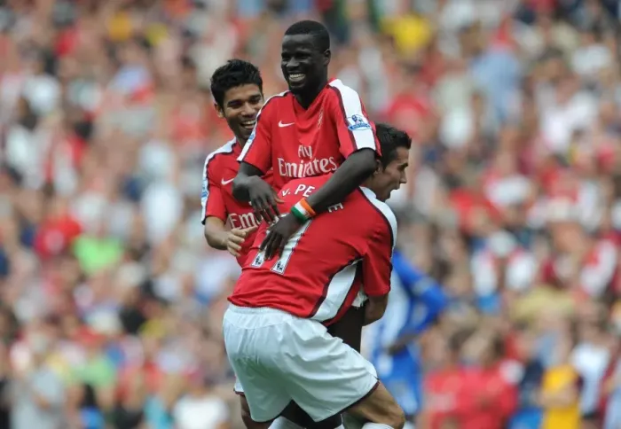 Framed Print : Arsenal's Triumph: Eboue, Eduardo, and van Persie's Unforgettable Celebration after a 4-0 Victory over Wigan Athletic