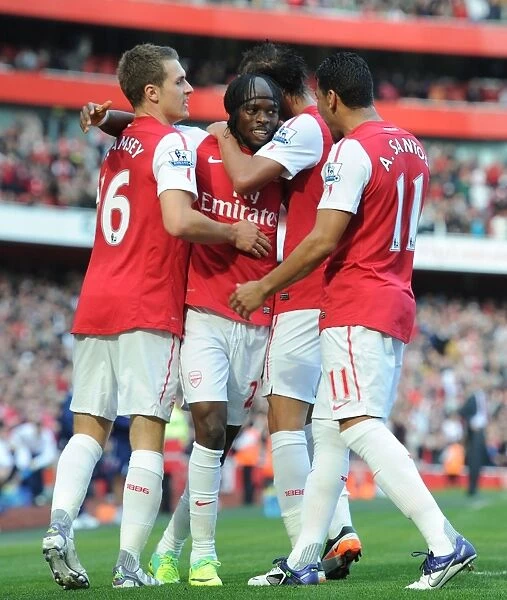 Arsenal's Triumph: Gervinho's Goal Celebration with Ramsey, Chamakh, and Santos (3-1 vs Stoke City, Premier League)