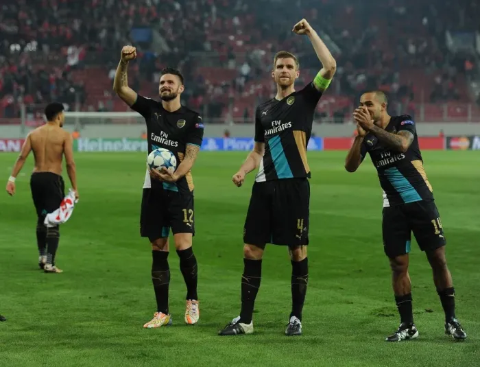 Framed Print : Arsenal's Triumph: Giroud, Mertesacker, and Walcott Celebrate Champions League Victory Framed Print : Arsenal's Triumph: Giroud, Mertesacker, and Walcott Celebrate Champions League Victory