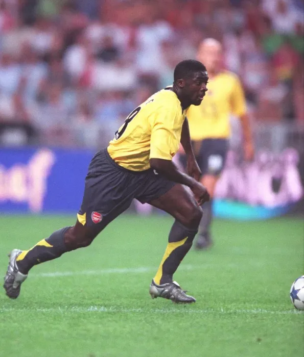 Framed Print : Arsenal's Triumph: Kolo Toure Leads the Way in Arsenal's 1-0 Victory over Ajax at the Amsterdam Tournament, 2005 Framed Print : Arsenal's Triumph: Kolo Toure Leads the Way in Arsenal's 1-0 Victory over Ajax at the Amsterdam Tournament, 2005