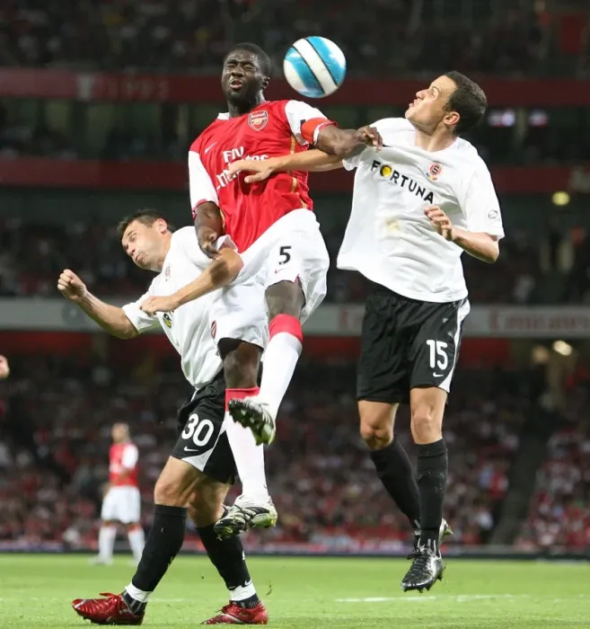 Framed Print : Arsenal's Triumph: Kolo Toure, Marek Kulic, and Jiri Kladrubsky in Action as Arsenal Crush Sparta Prague 3-0 in Champions League
