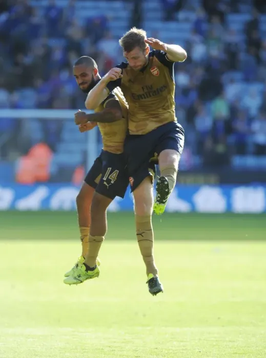 Framed Print : Arsenal's Triumph Over Leicester City in the 2015 / 16 Premier League: Theo Walcott and Per Mertesacker Celebrate Framed Print : Arsenal's Triumph Over Leicester City in the 2015 / 16 Premier League: Theo Walcott and Per Mertesacker Celebrate