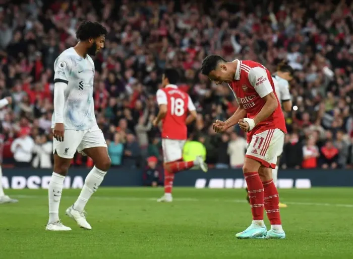 Framed Print : Arsenal's Triumph: Martinelli and Saka's Unforgettable Goal Celebration vs. Liverpool (2022-23)
