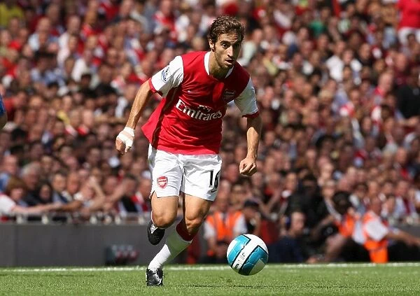 Arsenal's Triumph: Mathieu Flamini Leads the Gunners to a 3-1 Victory Over Portsmouth in the Barclays Premier League (September 2, 2007)