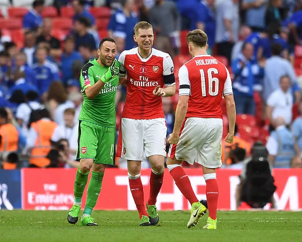 Arsenal's Triumph: Per Mertesacker, Rob Holding, and David Ospina Celebrate FA Cup Victory over Chelsea
