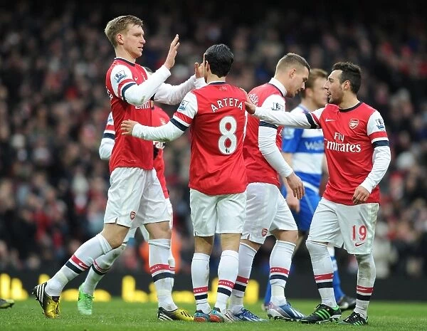 Arsenal's Triumph: Mikel Arteta and Team Celebrate Four-Goal Victory over Reading (2013)