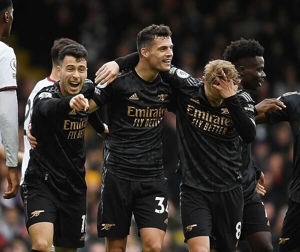 Arsenal's Triumph: Odegaard, Xhaka, and Martinelli Celebrate Second Goal