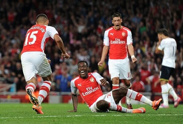 Arsenal's Triumph: Oxlade-Chamberlain, Welbeck, Ozil Celebrate Goals Against Tottenham