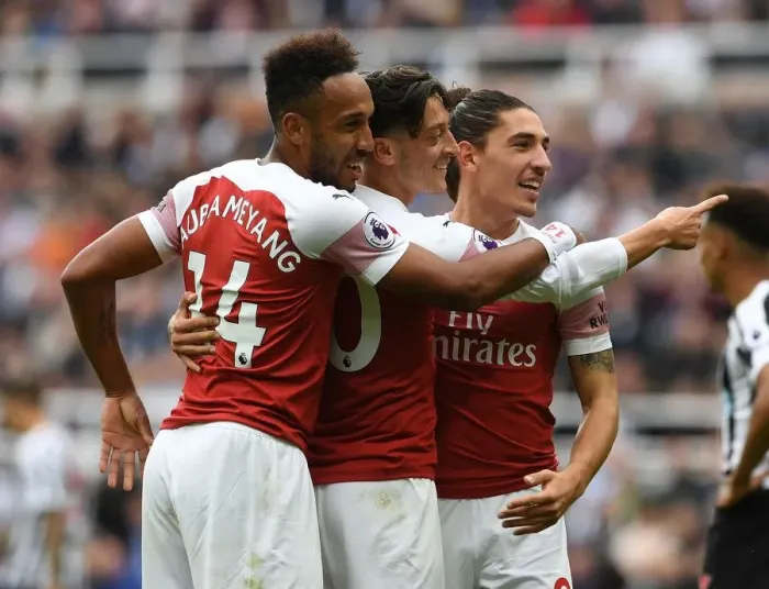 Framed Print : Arsenal's Triumph: Ozil, Bellerin, Aubameyang Celebrate Goals Against Newcastle United Framed Print : Arsenal's Triumph: Ozil, Bellerin, Aubameyang Celebrate Goals Against Newcastle United