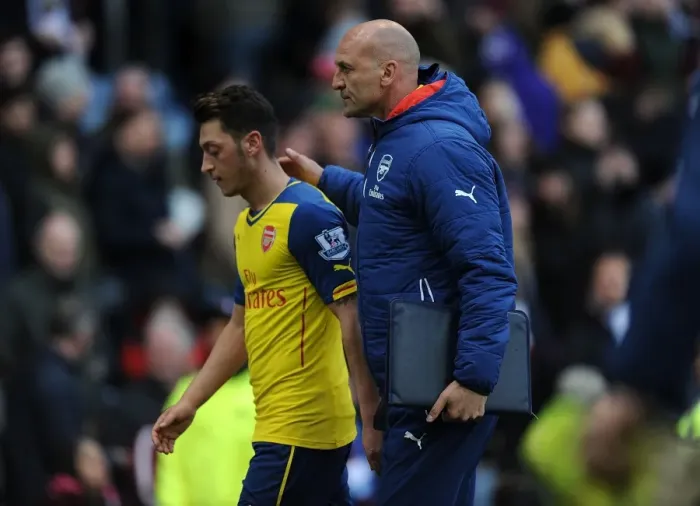 Framed Print : Arsenal's Triumph: Ozil and Bould Celebrate at Burnley's Turf Moor (2014 / 15)