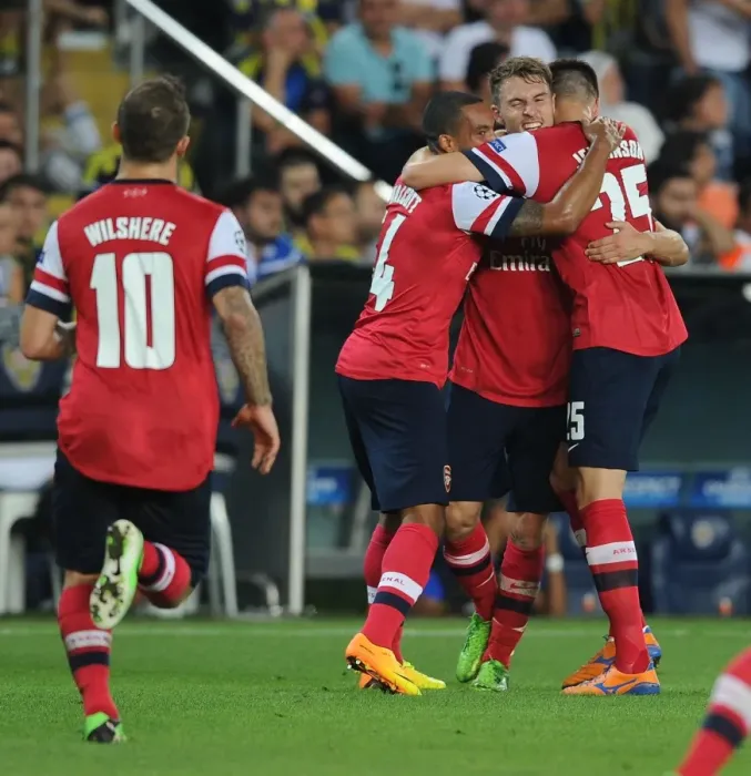 Framed Print : Arsenal's Triumph: Ramsey, Wilshere, Walcott Celebrate Goals Against Fenerbahce in Champions League Play-offs