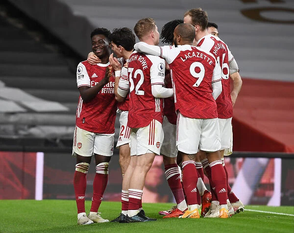 Arsenal's Triumph: Saka, Bellerin, Smith Rowe, and Lacazette Celebrate Goals Against Chelsea (2020-21)