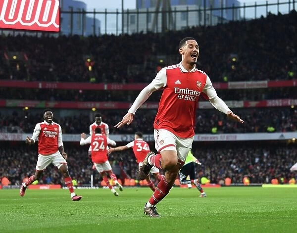 Arsenal's Triumph: Saliba and Nelson Celebrate Nelson's Goal vs. AFC Bournemouth (2022-23)