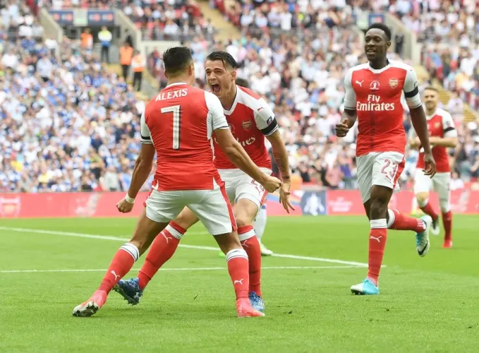Framed Print : Arsenal's Triumph: Sanchez, Welbeck, Xhaka Celebrate FA Cup Final Victory over Chelsea Framed Print : Arsenal's Triumph: Sanchez, Welbeck, Xhaka Celebrate FA Cup Final Victory over Chelsea