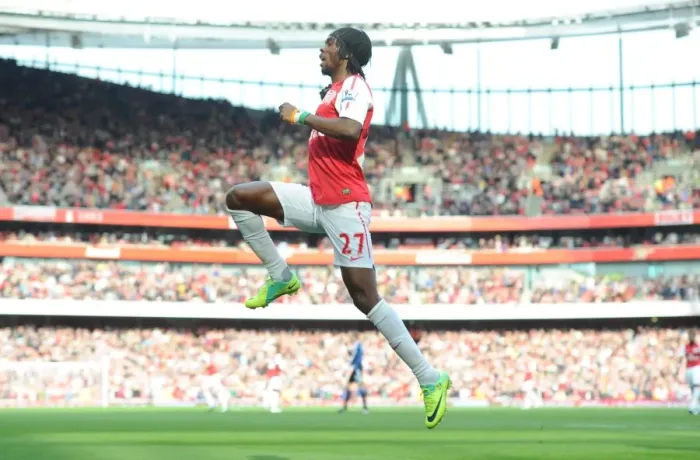 Framed Print : Arsenal's Triumph over Stoke City: Gervinho's Goal - 3:1 Premier League Victory